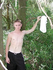 Twink hides and jerks off all alone in the woods - Gay porn pics at Gaystick
