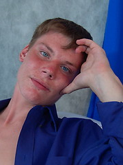 Angel - lovely blue-eyed boy bares his strong cock and gives it a firm handshake - Gay porn pics at Gaystick