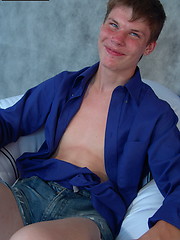 Angel - lovely blue-eyed boy bares his strong cock and gives it a firm handshake - Gay porn pics at Gaystick