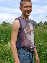 Naughty outdoor enthusiast Hubert playing with his cock on a green meadow - Gay porn pics at Gaystick