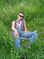 Naughty outdoor enthusiast Hubert playing with his cock on a green meadow - Gay porn pics at Gaystick