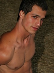 Horny naked twink posing in a barn - Gay porn pics at Gaystick