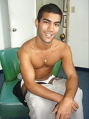 Hot latin dude Andres jerks his cock on black sofa - Gay porn pics at Gaystick
