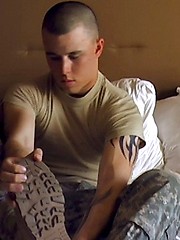 Kenny sits in a chair with his legs spread and puts on a good first show - Gay porn pics at Gaystick