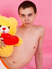 Straight guy Timmy Wright exposes his body with teddy in hands - Gay porn pics at Gaystick