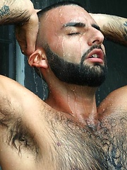 Hot bearded stud David Camacho shows off his hairy body and furry ass in a sexy backyard shower scene - Gay porn pics at Gaystick