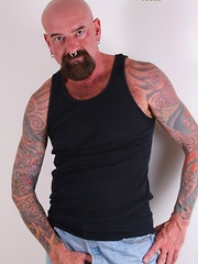 Southern bear Tex Madux is a tough tatted man that likes to fuck with his work boots on - Gay porn pics at Gaystick