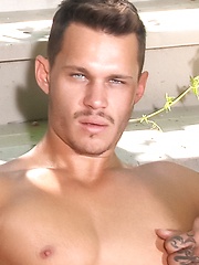 Tate Ryder shows his boner on a porch - Gay porn pics at Gaystick