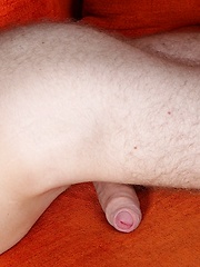 Pete Kome spreads his hairy ass before cumming on his stomac...