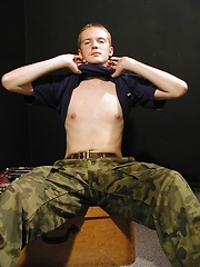 Sexy Adam Rogers peels off his camouflage pants. - Gay porn pics at Gaystick